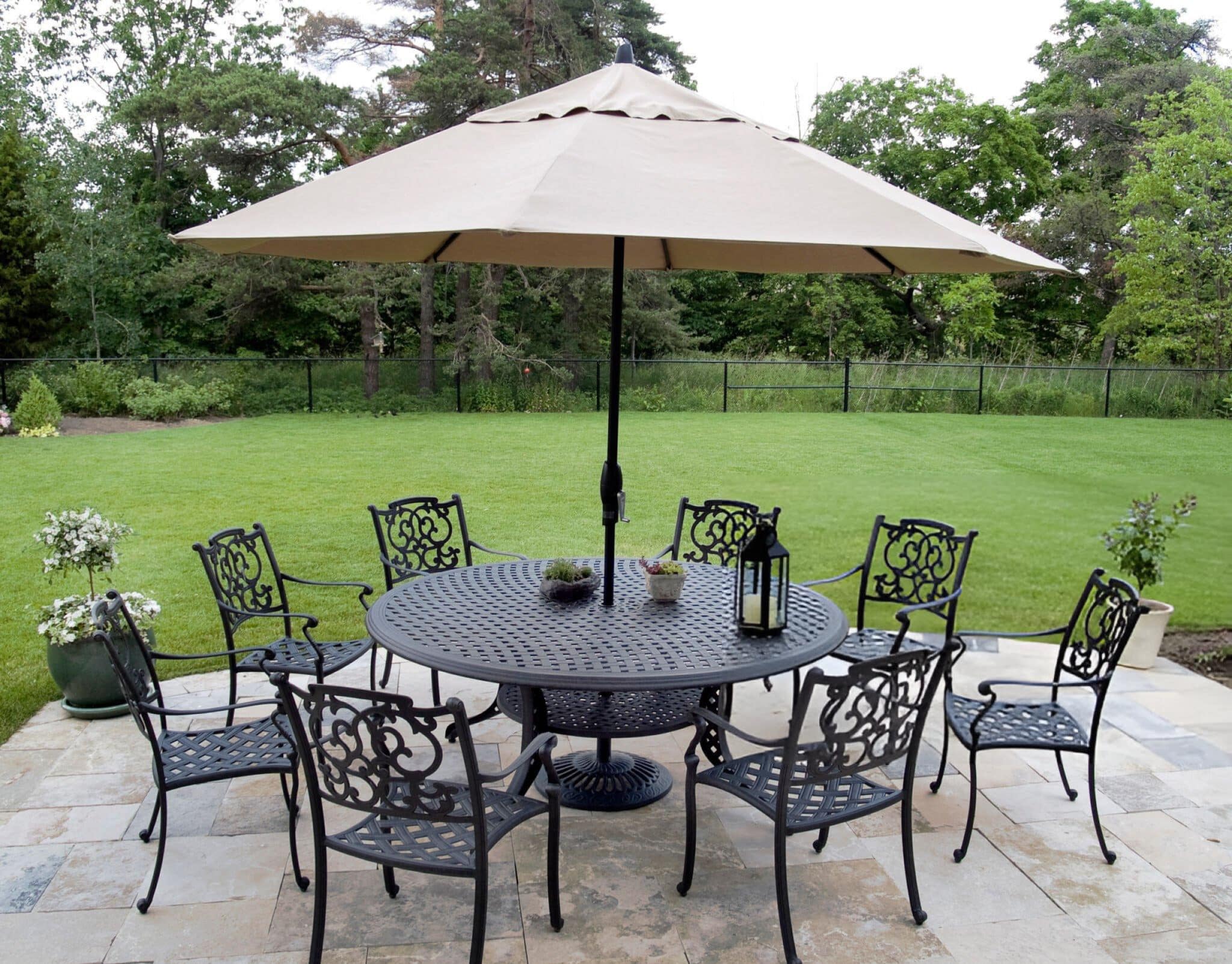 patio umbrella and cast aluminum furniture