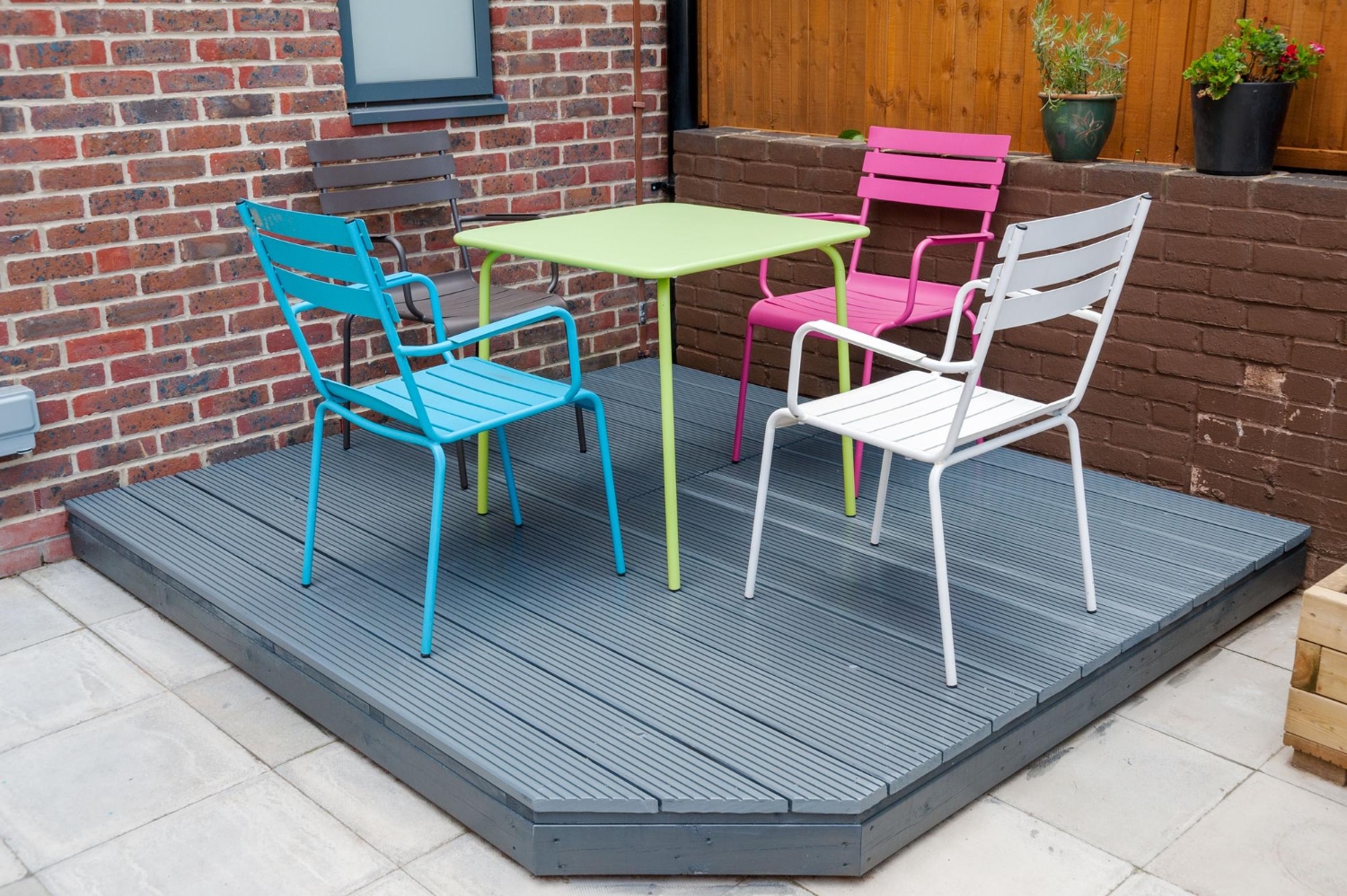 PVC patio dining table sized for a Florida family cookout